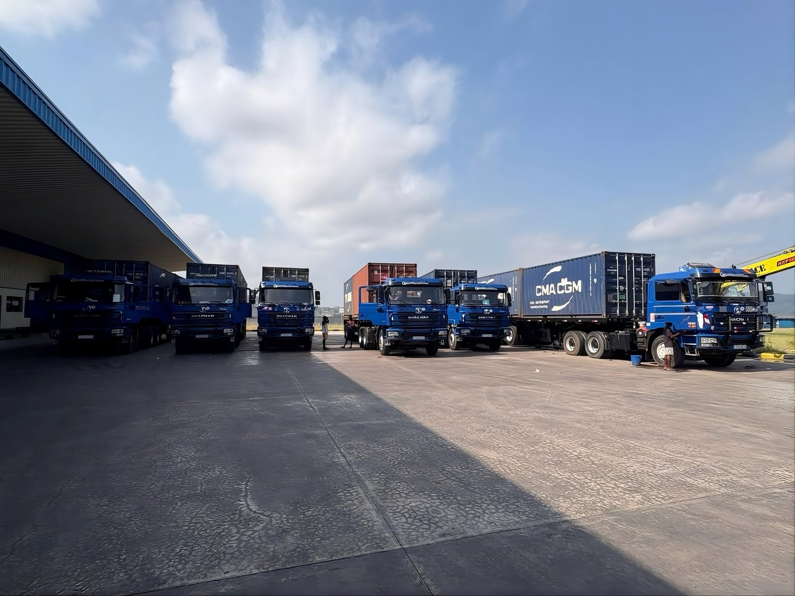 Capital Logistics fleet of cargo trucks and containers at a DRC depot
